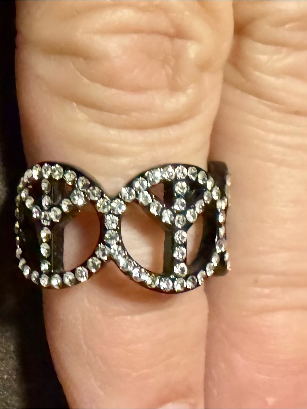 Crystal Accent Black Ring with Interlocking Circles